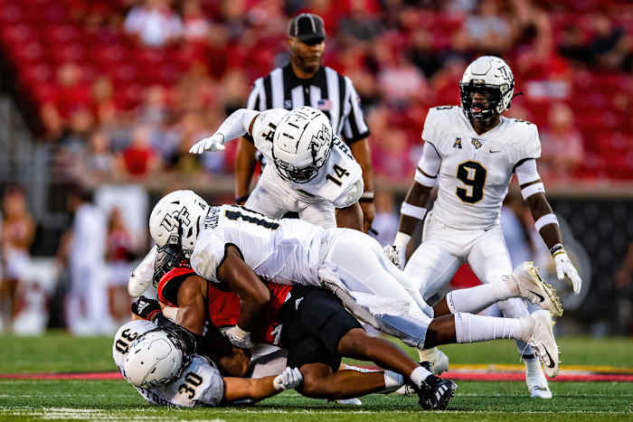 Bryson Armstrong (#30) finds the football and makes tackles